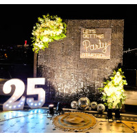 25th Celebration Backdrop Decoration with Neon Sign & Floral Decor